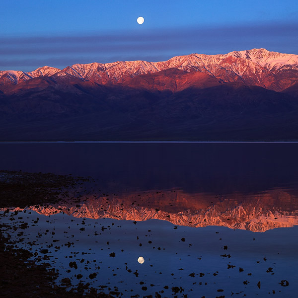 Moonrise, Telegraph Peak and the Panamint Mountains are reflected in what many have called Lake Manly during the unusual winter...