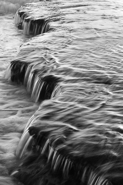 Low tide creates these unique waterfalls.