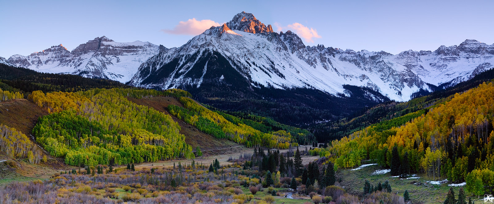 Towards the end of country road 7 near Ridgway, Colorado, the view opens up and shows off the snow covered Sneffels Range and...