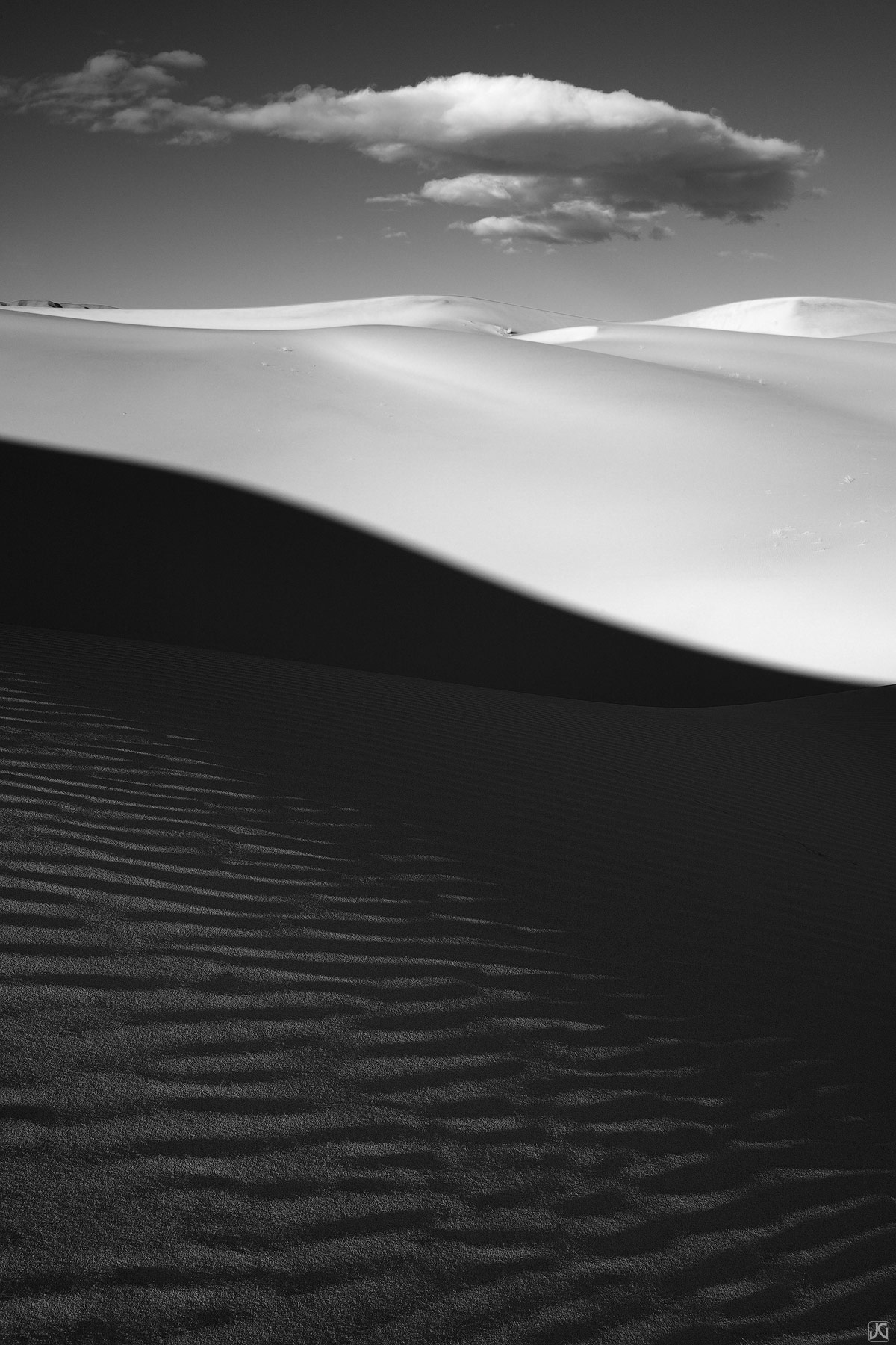 Early morning light begins to take over this sand dune shadow.
