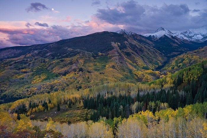 An autumn moon rises over Capitol Creek.