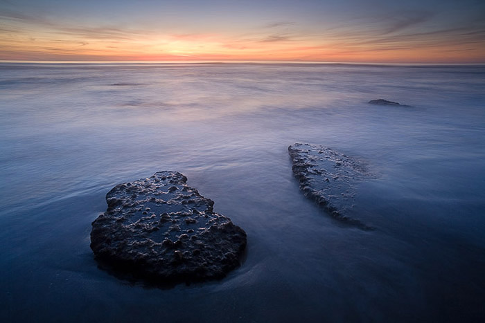 Shoreline rocks seem to be steps out to the sea.