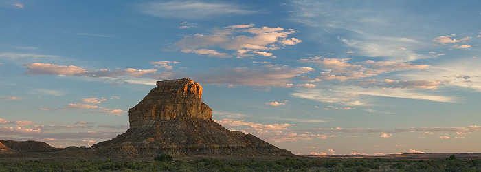 Fajada Butte basks in the golden light of sunset. Fajada Butte is a prominent landmark of Chaco Culture National Historic Park...