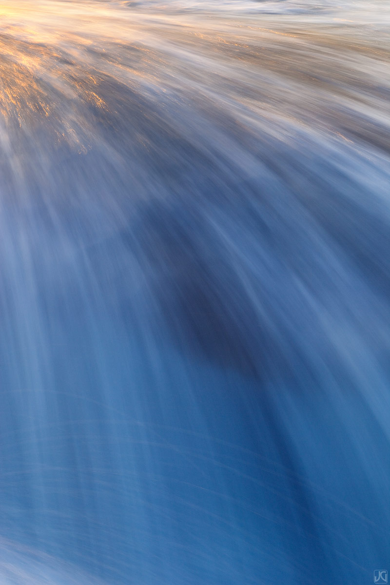 High tide transforms the shoreline near La Jolla into a series of short lived waterfalls that reflect the last light of a nice...