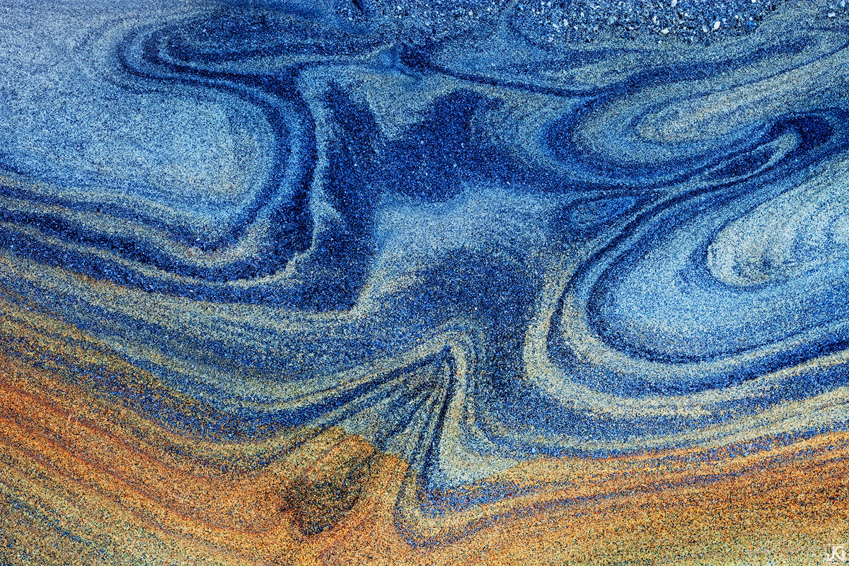 Abstract shapes, patterns and colors can be seen when there are low tides along this beach near San Diego.