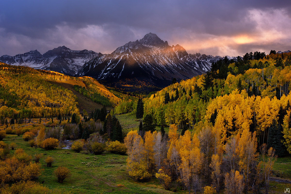 The Sneffles Range acts as a giant backdrop, like a grand theater production, and the glowing aspen across the valley are beaming...