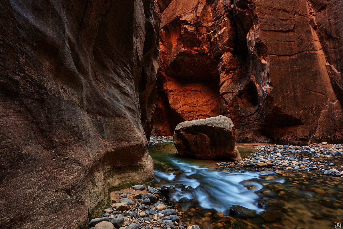 In the Narrows, the Virgin River cuts through layers of sandstone and brings millions of tons of sediment and rocks through during...