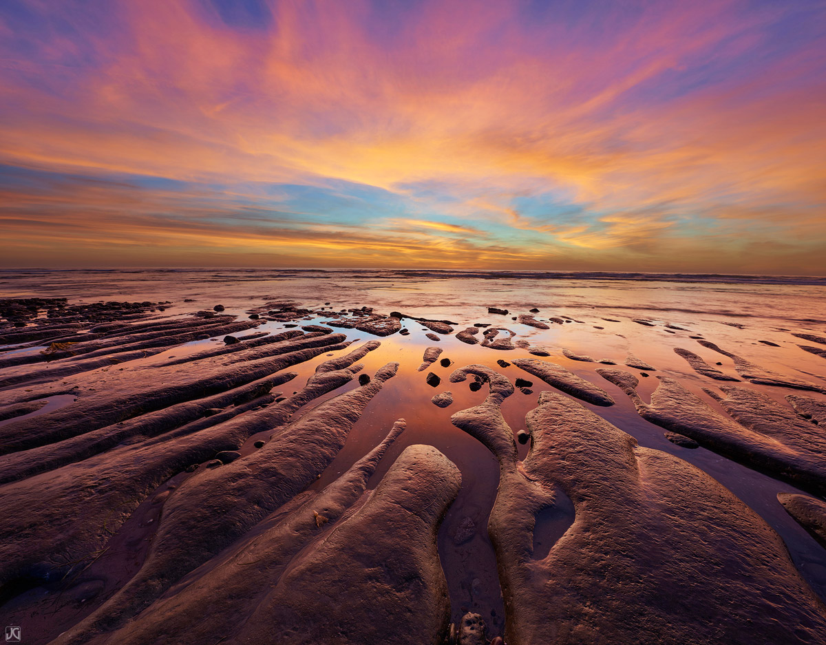 The are moments when things are just in sync. This was one of them, as the sunset clouds and formations along the coast complimented...