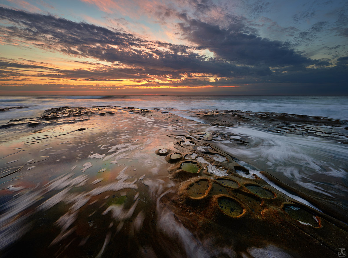 Reflections on the water and in the potholes are one of the main reasons I go to this spot along the coast of La Jolla. It's...