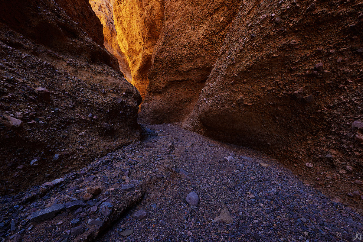 Mid day sunlight provides some bounce light into this small canyon, creating a nice soft glow in the shadows of the desert.