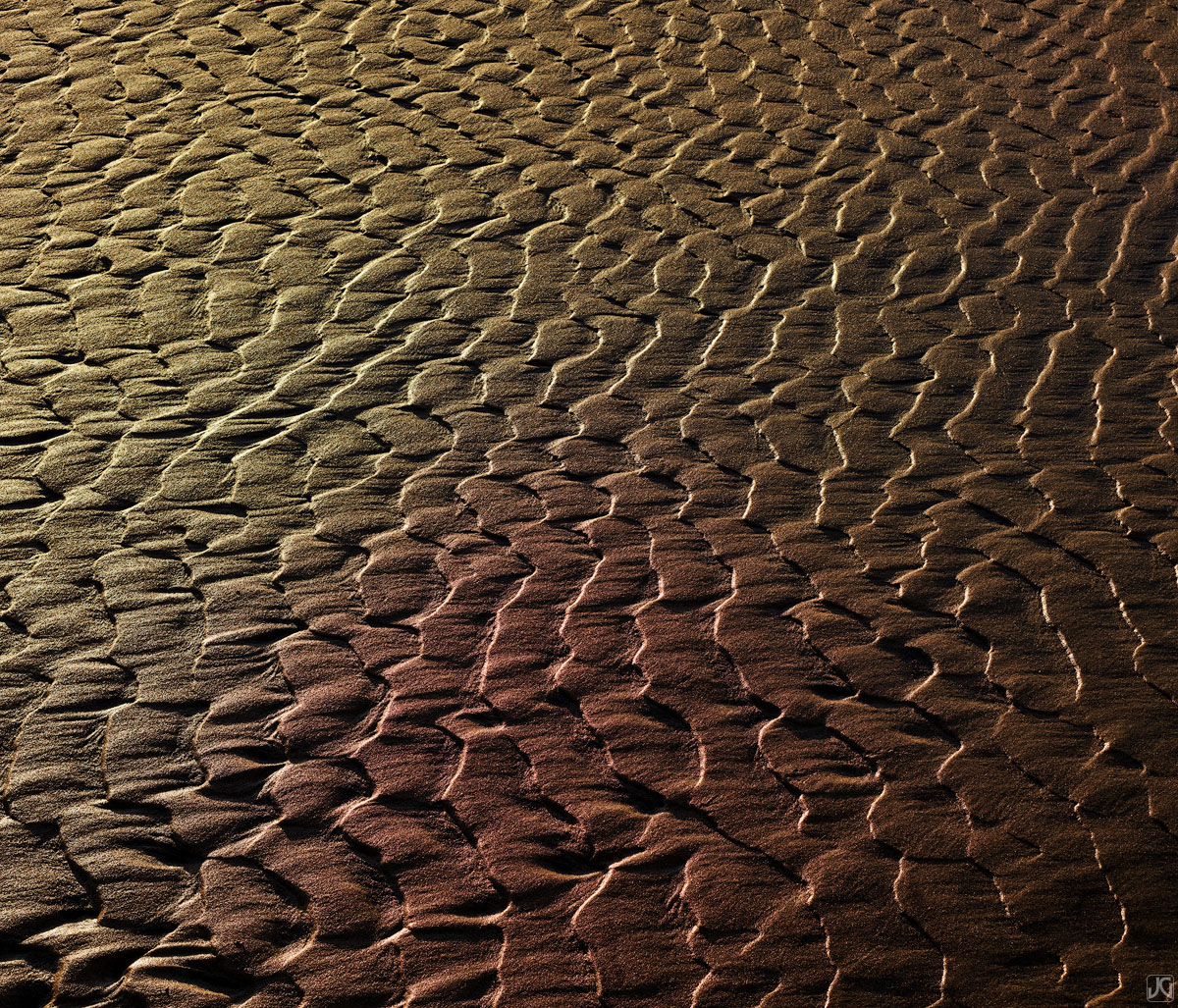 Sunset glows across these patterns in the sand at low tide. I love heading to the beach and finding undisturbed creations before...