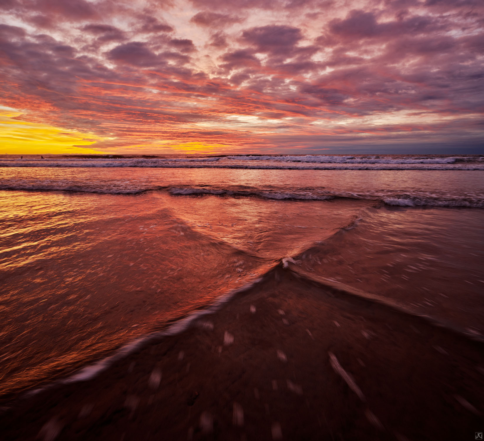 Late autumn light dashes across these cool cloud formations at sunset, as the ripples and patterns in the water compliment the...